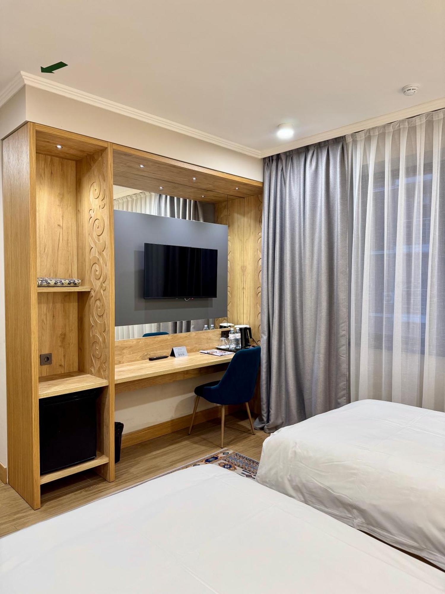 Dami Almaty Hotel Экстерьер фото